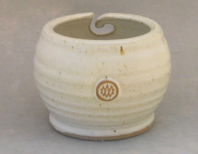 white pottery yarn bowl