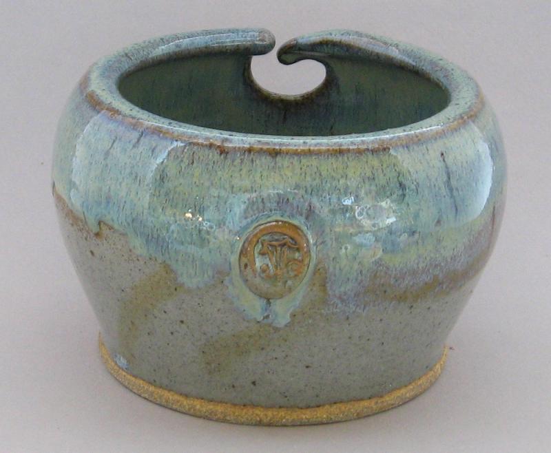 northern lights with grey bottom stoneware glaze